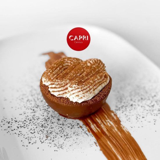 Gourmet chocolate (50% chocolate mousse with vanilla cream, chocolate sponge cake, chocolate glaze and whipped cream cloud)